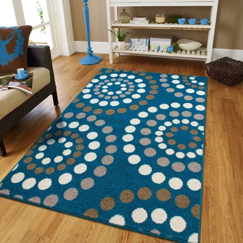 A beach-themed area rug with a circular pattern reminiscent of seashells and waves