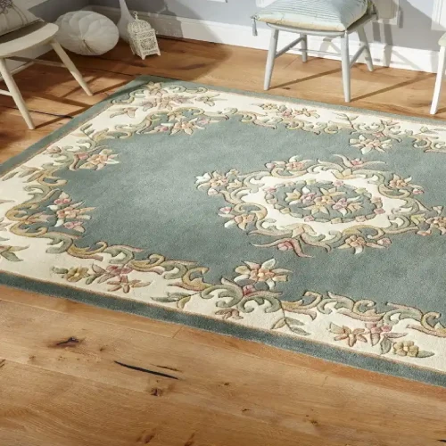 A luxurious oriental rug made of silk with a shimmering, iridescent sheen