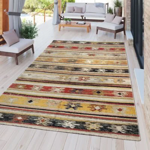 The rug is perfect for both indoor and outdoor use and features a striped pattern with intricate details.