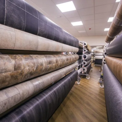 A large selection of vinyl carpets in various colors and patterns