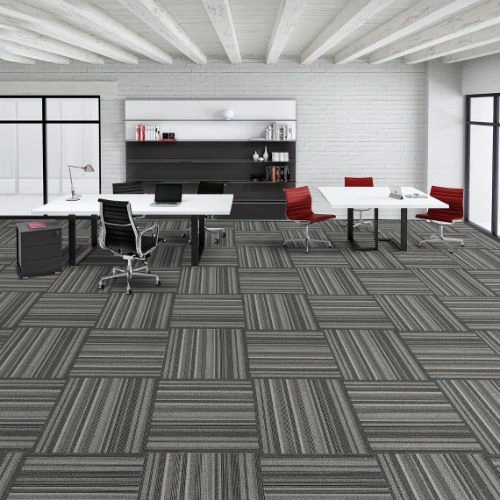 Modern office space with grey and black striped carpet tiles in Dubai