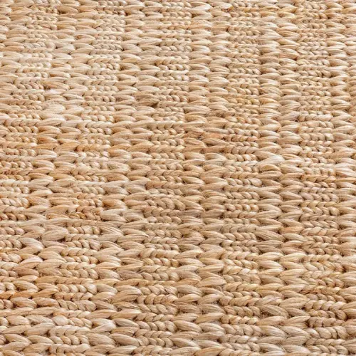 Textured jute rug in a classic herringbone pattern